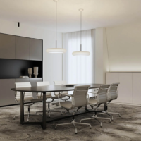 Die LED Pendelleuchte Belux Oto 34 erhellt das Besprechungszimmer